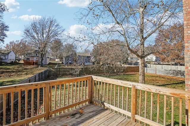 wooden deck with a yard