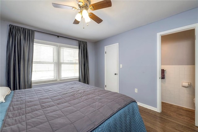 bedroom featuring dark wood-type flooring and ceiling fan