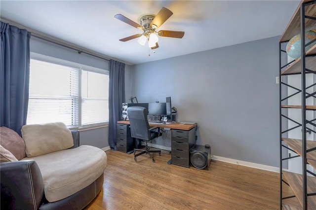 office area with hardwood / wood-style flooring and ceiling fan