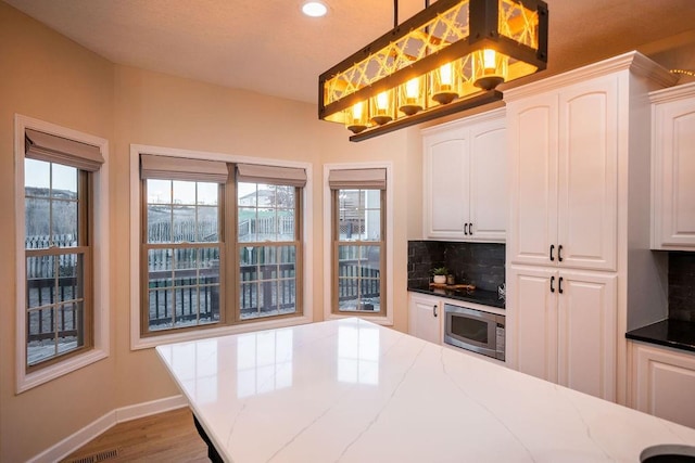 dining room featuring light hardwood / wood-style floors