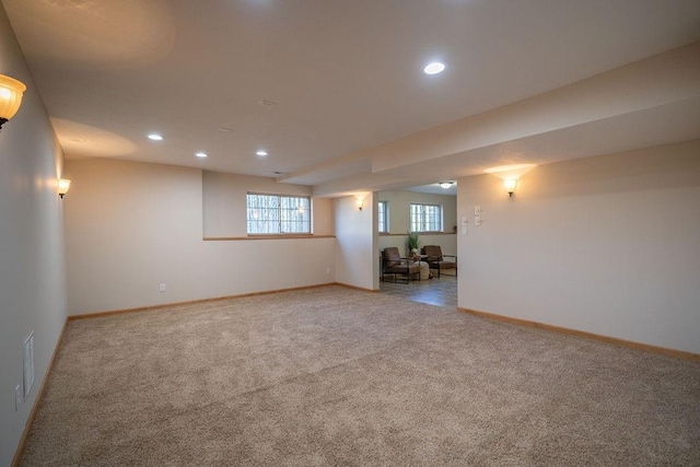 basement featuring carpet flooring