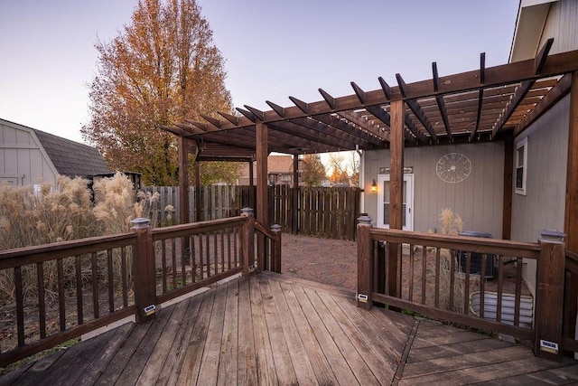 deck at dusk with a pergola