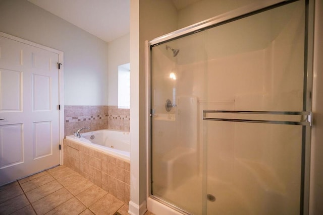 bathroom featuring separate shower and tub and tile patterned flooring