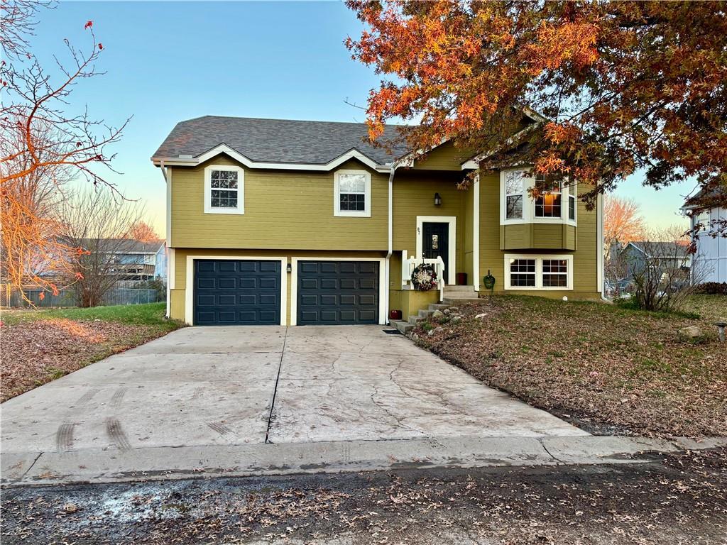 bi-level home featuring a garage