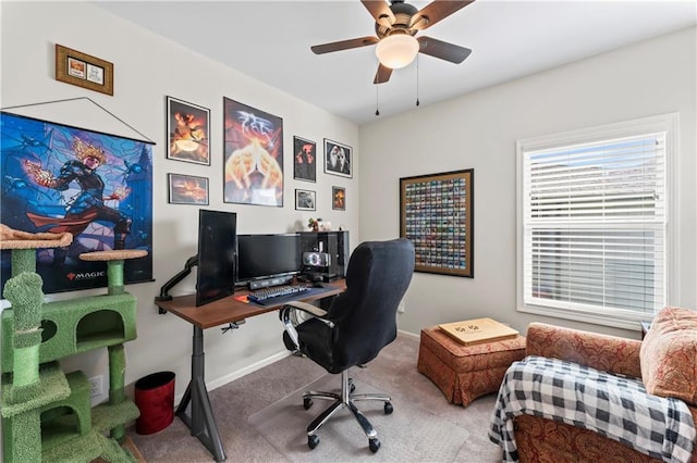 office featuring carpet floors and ceiling fan