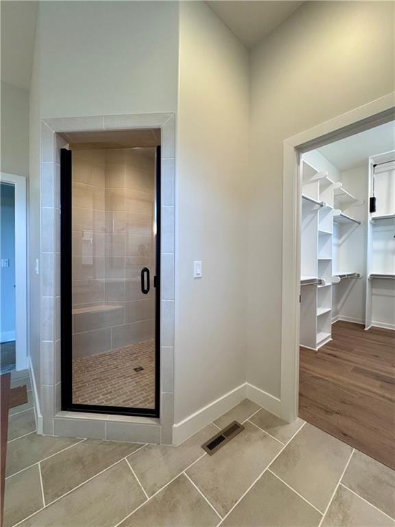 7719 NE 103rd Ter, Kansas City, MO 64157 - doorway with tile patterned floors and baseboards