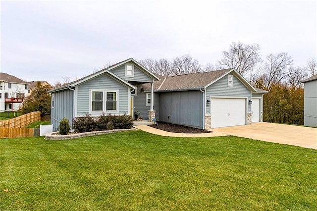 ranch-style home with a front yard and a garage