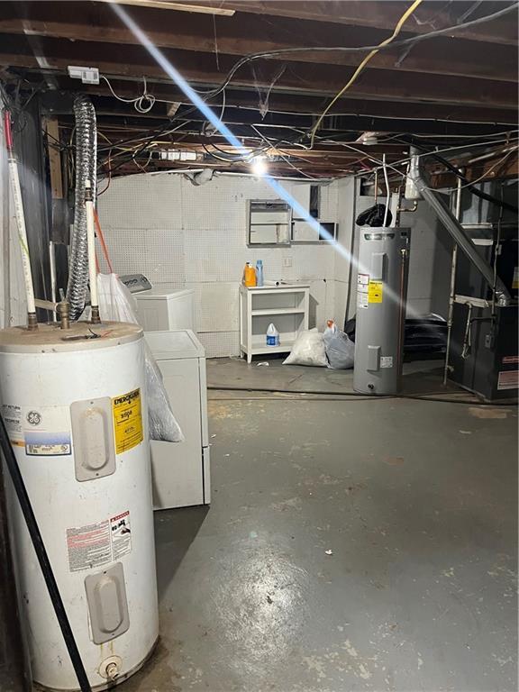 basement with heating unit and water heater