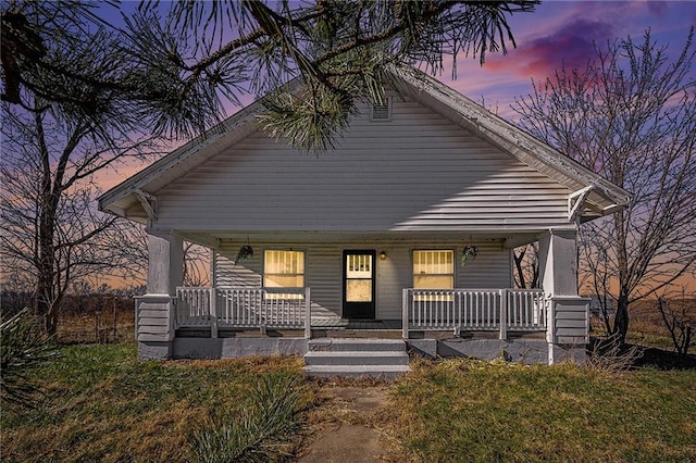 bungalow-style house featuring covered porch