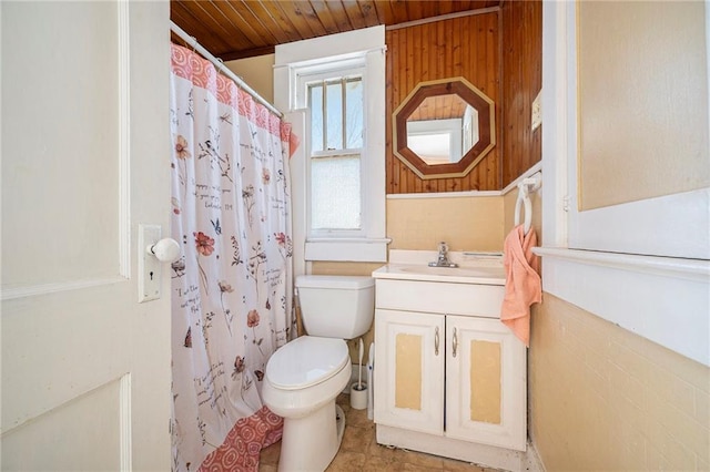 bathroom featuring wooden ceiling, a shower with curtain, wood walls, toilet, and vanity