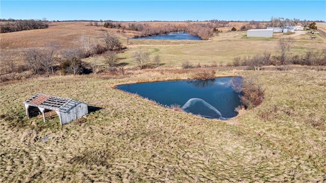 aerial view featuring a water view and a rural view