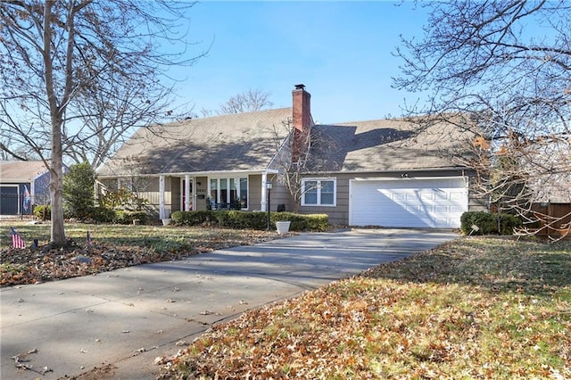 ranch-style house featuring a garage