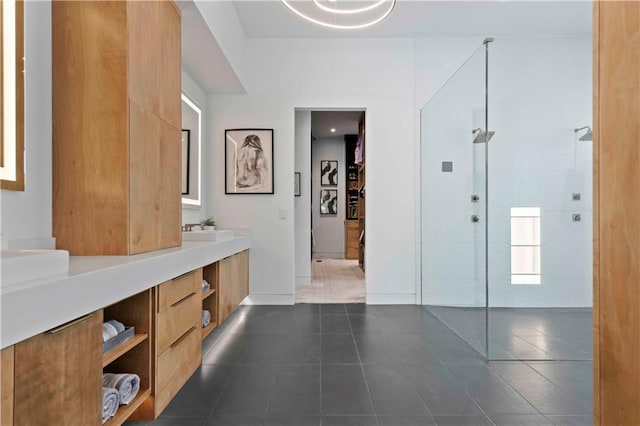 12604 W 160th St, Overland Park, KS 66062 - full bathroom featuring double vanity, tile patterned floors, walk in shower, and baseboards