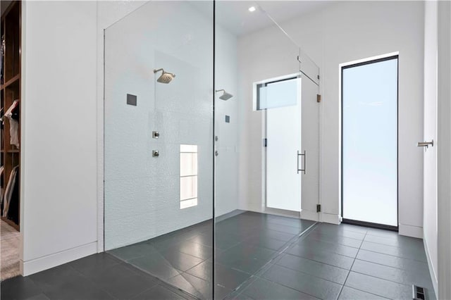 foyer with dark tile patterned floors