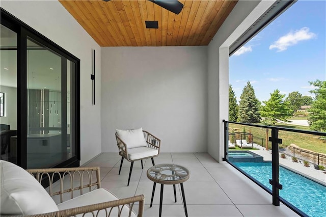 12604 W 160th St, Overland Park, KS 66062 - balcony featuring a pool with connected hot tub, view of pool, and ceiling fan