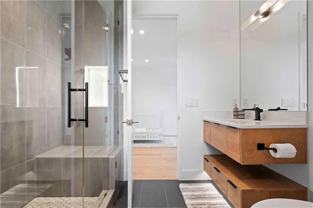 12604 W 160th St, Overland Park, KS 66062 - bathroom with a shower stall, vanity, tile patterned floors, and baseboards