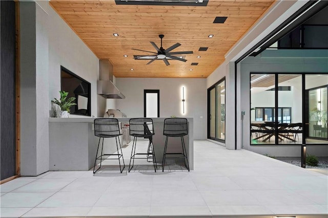 view of patio / terrace featuring ceiling fan