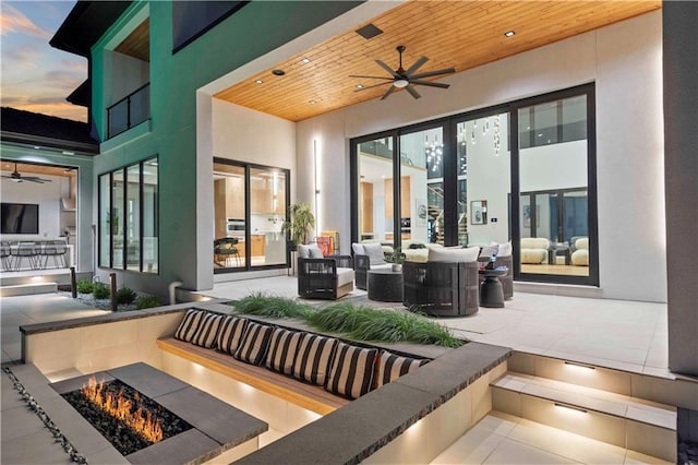 12604 W 160th St, Overland Park, KS 66062 - view of patio featuring ceiling fan and an outdoor living space with a fire pit