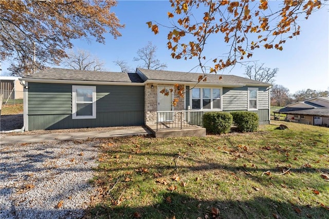 ranch-style house with a front yard