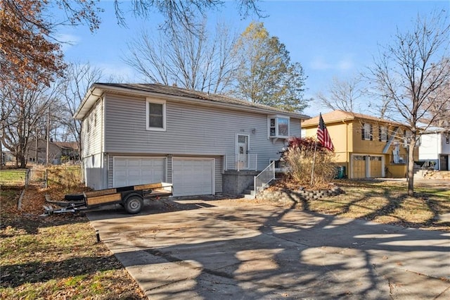 back of property featuring a garage