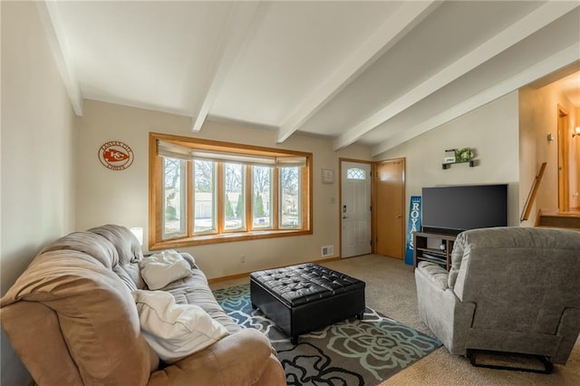 living room featuring lofted ceiling with beams, visible vents, and carpet floors