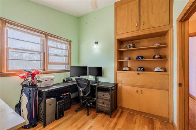 office space with light wood-type flooring