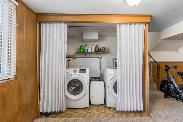 clothes washing area featuring laundry area and independent washer and dryer