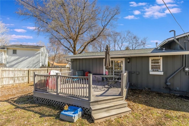 wooden deck featuring fence