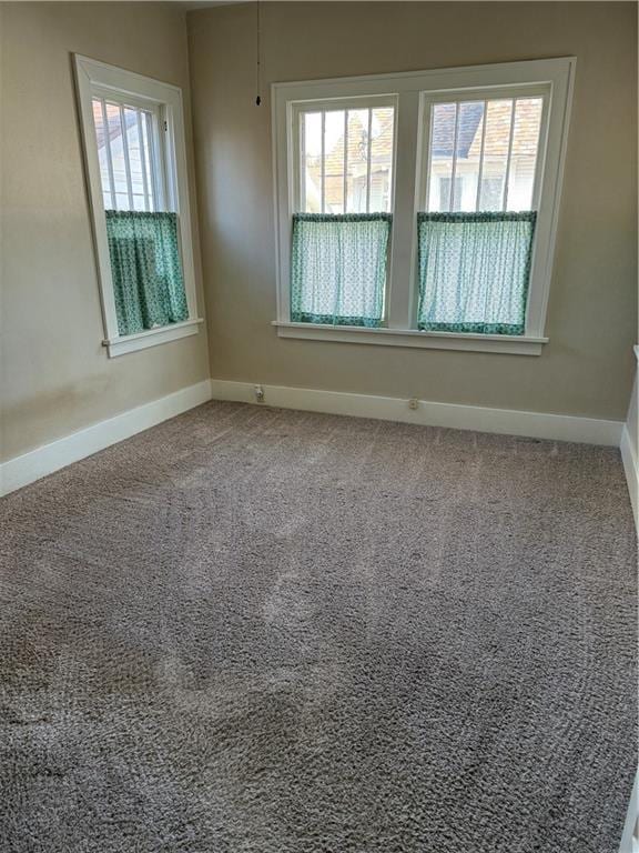 view of carpeted spare room