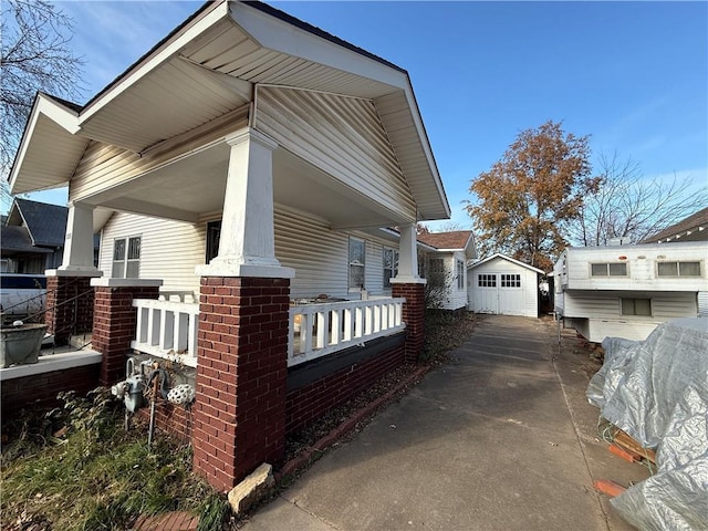 view of property exterior featuring a porch