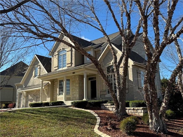 view of property featuring a front yard