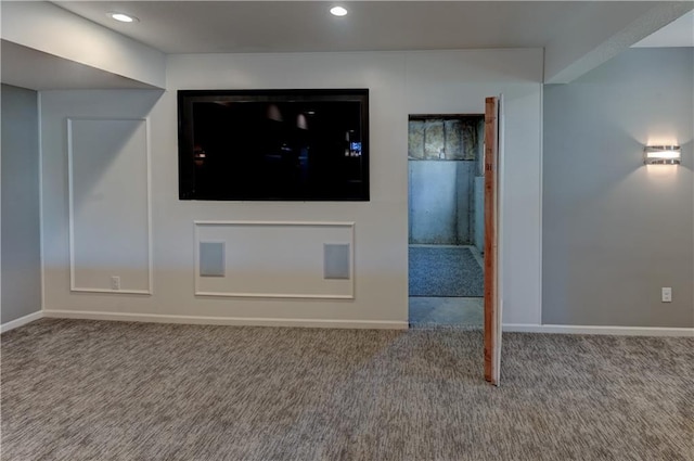 unfurnished living room featuring carpet floors