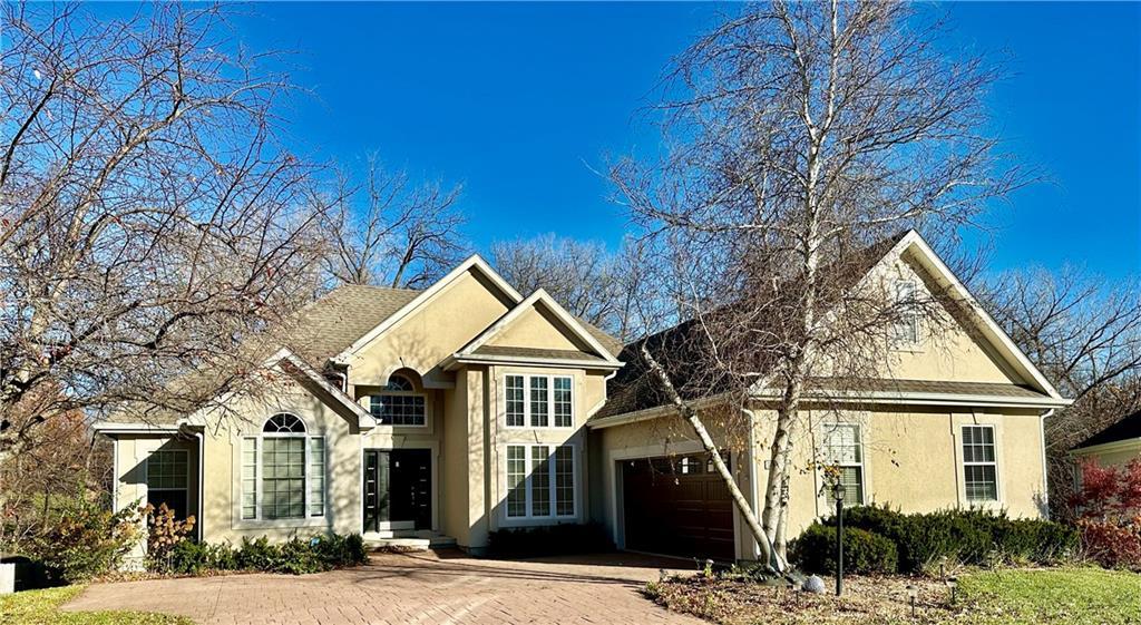 front facade with a garage