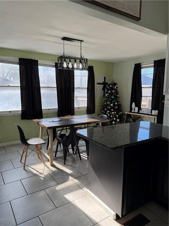 tiled dining space with plenty of natural light