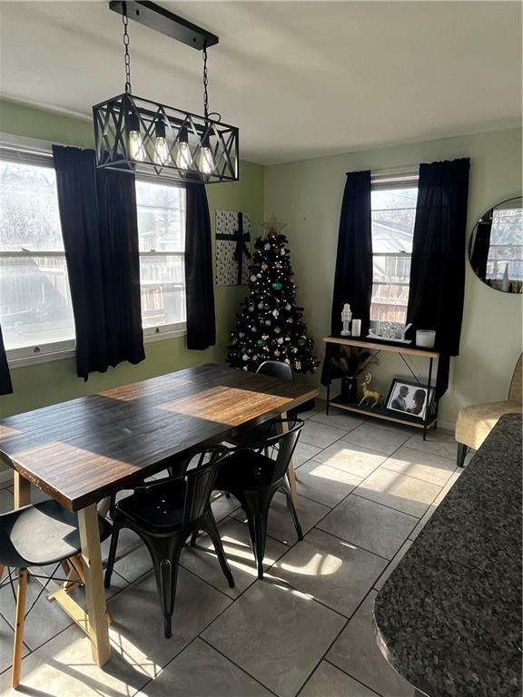 tiled dining space with plenty of natural light