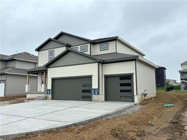 13408 W 178th St, Overland Park, KS 66013 - view of front of home with a garage, concrete driveway, and roof with shingles