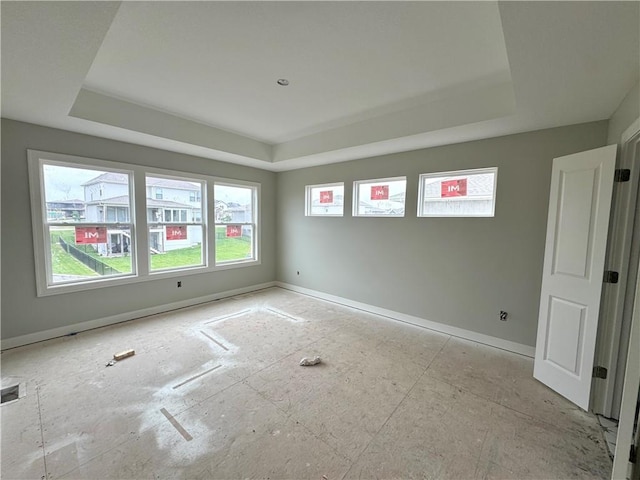 13408 W 178th St, Overland Park, KS 66013 - spare room featuring a raised ceiling and baseboards