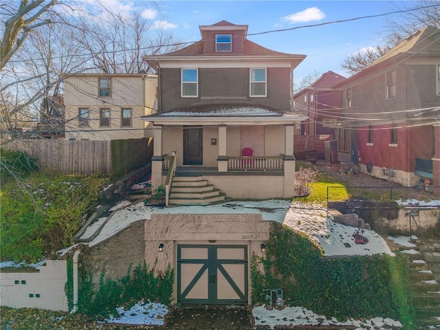 view of property featuring a porch