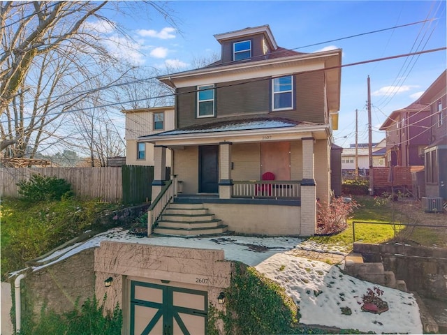 view of front of property with central AC unit and covered porch