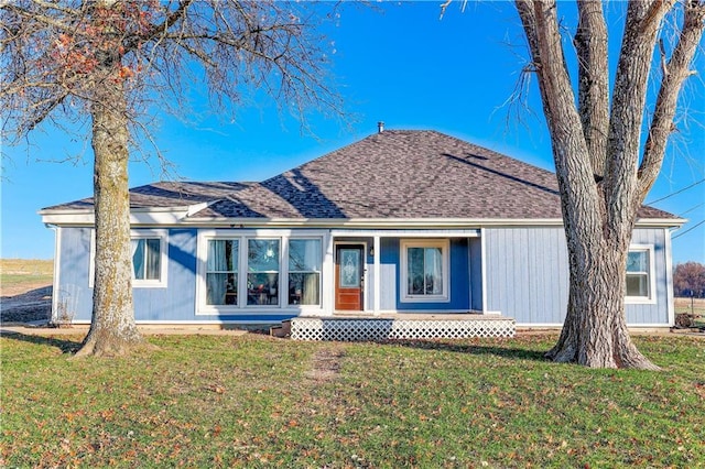 view of front of home with a front lawn