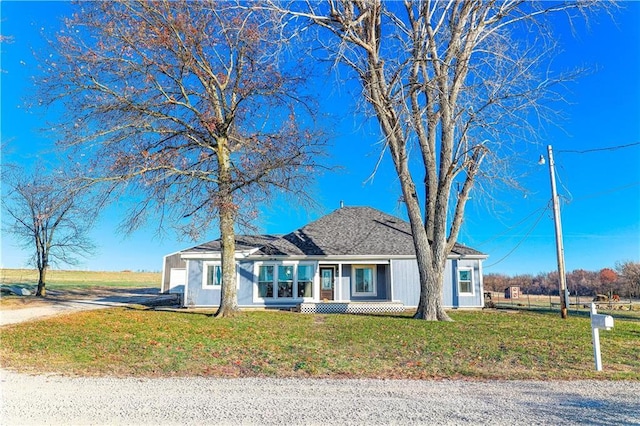 ranch-style house with a front yard