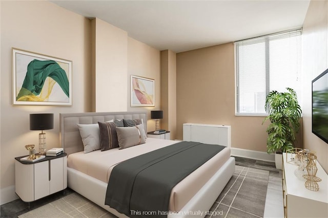 bedroom featuring wood-type flooring