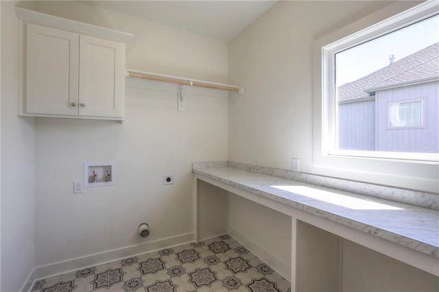 laundry room with hookup for an electric dryer, cabinets, and hookup for a washing machine