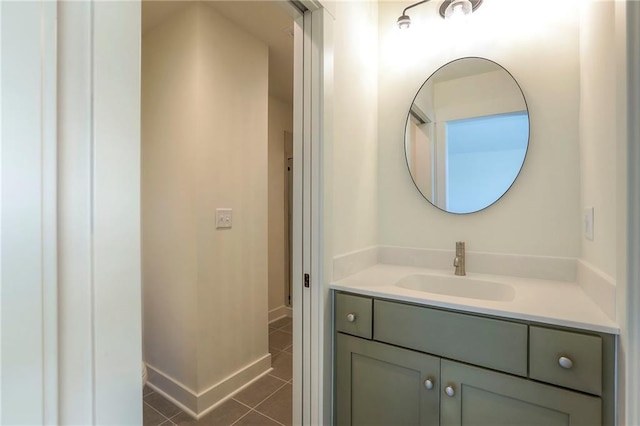 bathroom featuring tile patterned flooring and vanity