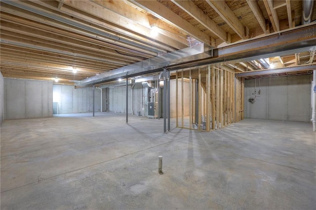 basement featuring heating unit