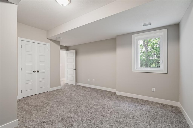 basement featuring carpet flooring