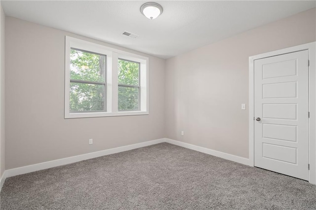 view of carpeted spare room