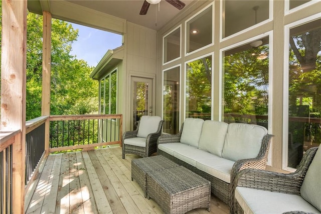 sunroom / solarium with ceiling fan