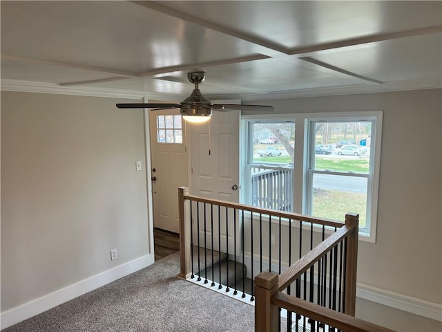 hall with carpet flooring and crown molding