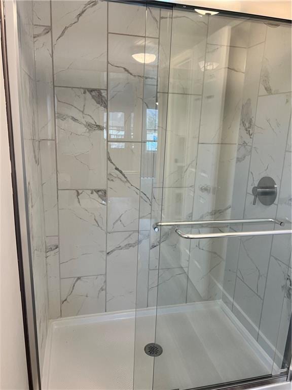 bathroom featuring walk in shower